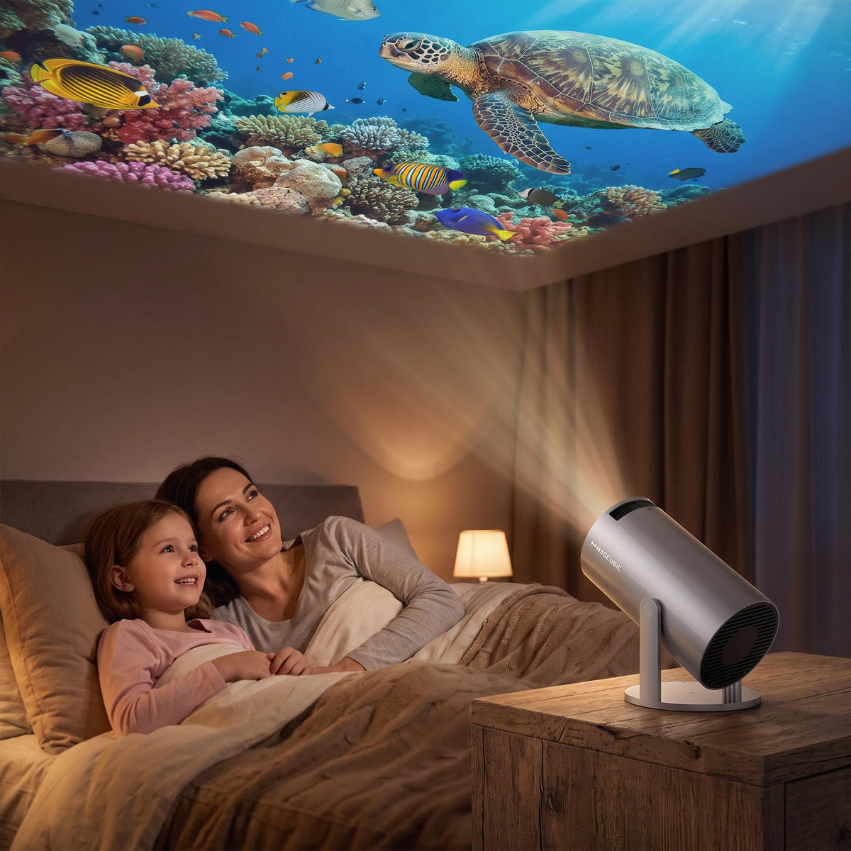 Proyector HY300 Pro girado hacia el techo para ver el fondo marino desde la cama